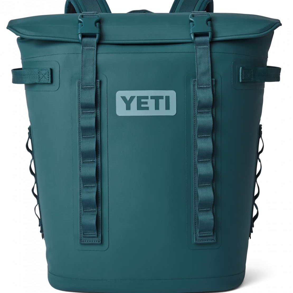 Yeti Hopper M20 Soft Backpack Cooler - A large, dark gray cooler with a zippered main compartment and two side pockets, featuring a backpack-style shoulder strap system.