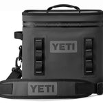 Yeti Hopper Flip 12 Personal Cooler - A dark gray cooler with a zippered top and two handles, featuring a rectangular shape and a small handle on top.