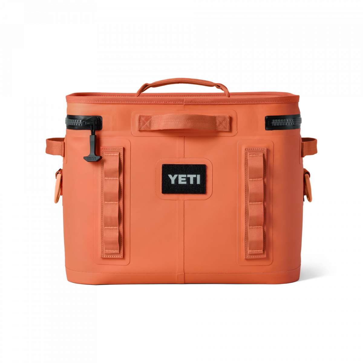 Yeti Hopper Flip 12 Personal Cooler - A coral-colored cooler with a handle on top and an orange zipper pull.