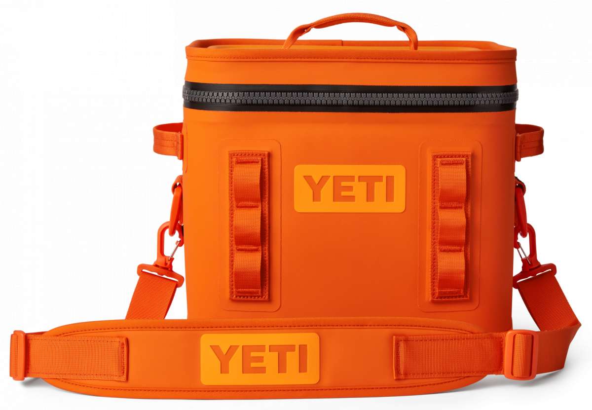 Yeti Hopper Flip 12 Personal Cooler - A small, rectangular cooler with a handle on top and an orange color.