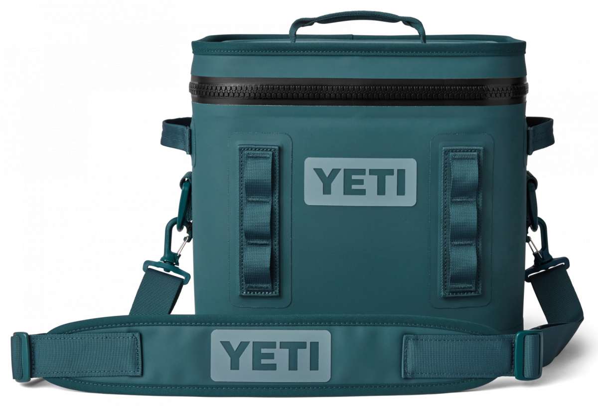 Yeti Hopper Flip 12 Personal Cooler - A dark gray cooler with a handle on top and an adjustable shoulder strap attached to its side.