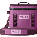 Yeti Hopper Flip 12 Personal Cooler - A purple cooler with a zipper along the top and two handles on either side.