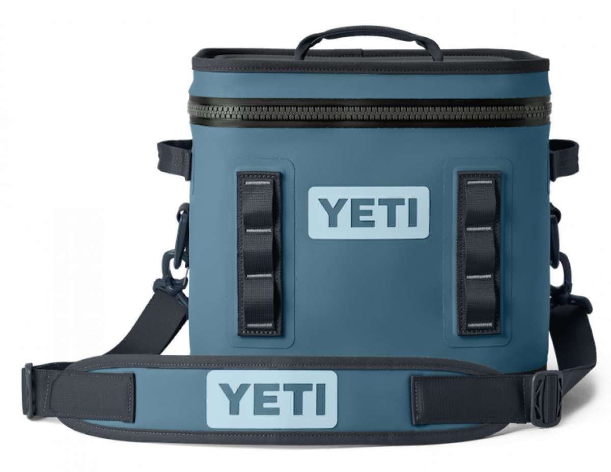 Yeti Hopper Flip 12 Personal Cooler - A blue cooler with a zipper closure and two handles on top, featuring an "YETI" logo in white letters on one side.