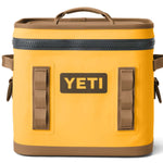 Yeti Hopper Flip 12 Personal Cooler - A yellow cooler with a handle on top and two side handles, featuring a zipper closure.