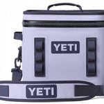 Yeti Hopper Flip 12 Personal Cooler - A light gray cooler with a zippered top and two handles, one on each side.