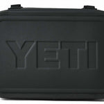 Yeti Hopper Flip 18 Personal Cooler - A black cooler with a handle on top and a zipper closure at the front.