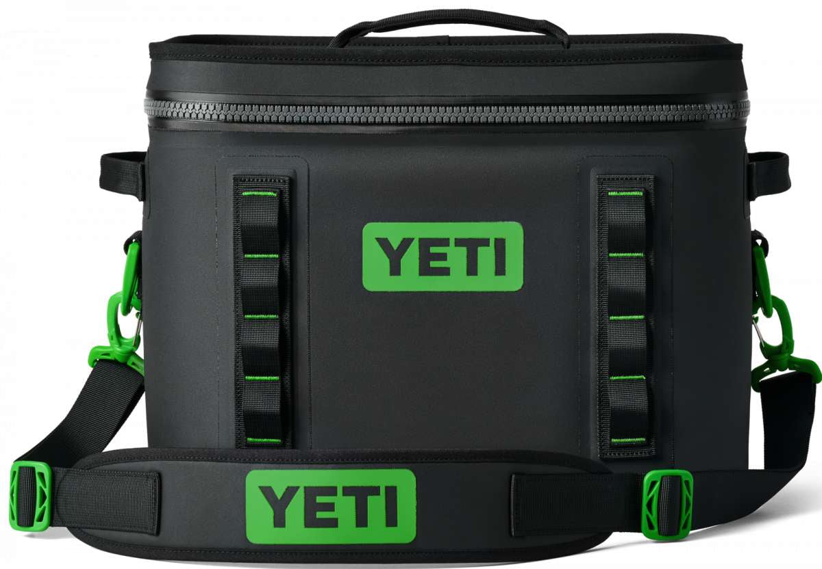 Yeti Hopper Flip 18 Personal Cooler - A black cooler with a zipper closure and green accents on the handle and logo.
