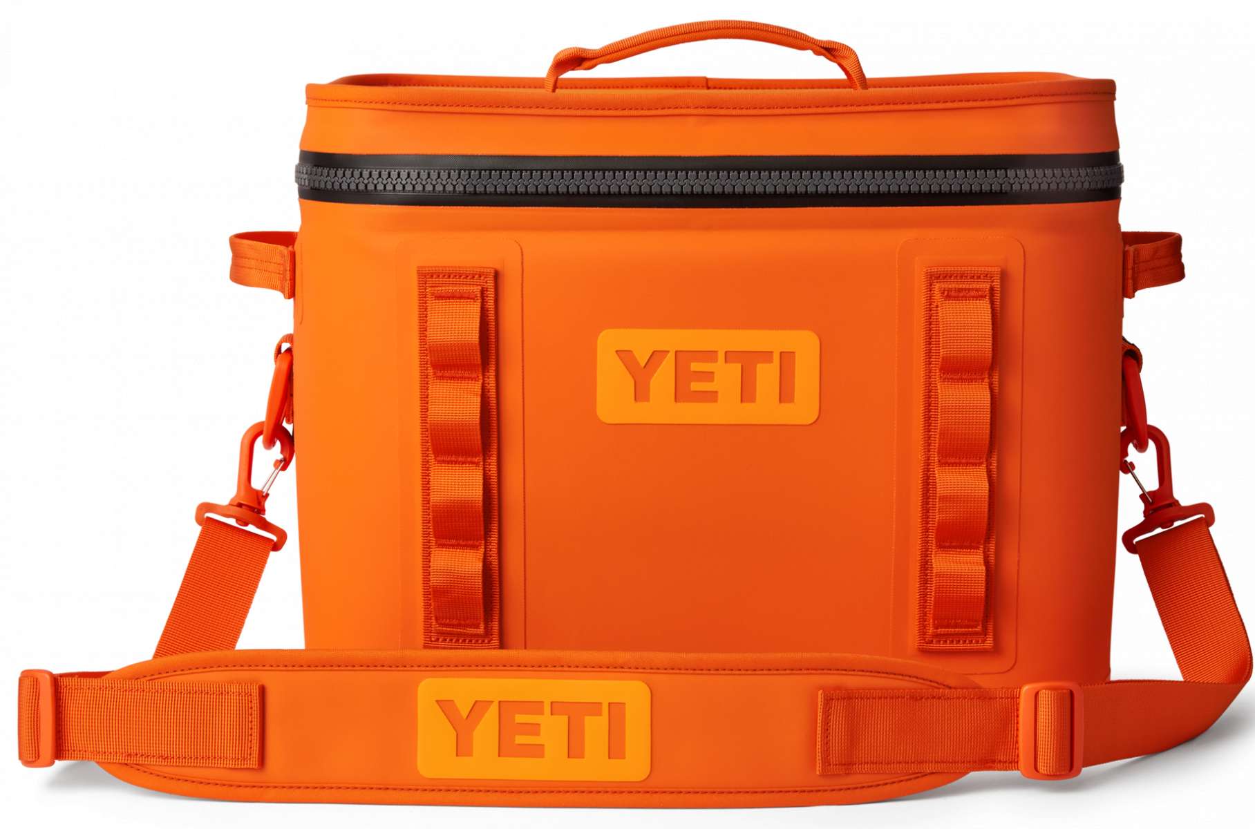 Yeti Hopper Flip 18 Personal Cooler - A cooler with a dark gray lid and a light gray body, featuring a handle on top and an orange logo.