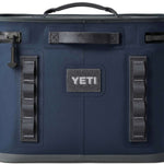 Yeti Hopper Flip 18 Personal Cooler - A navy blue cooler with a handle on top and an orange logo on one side.