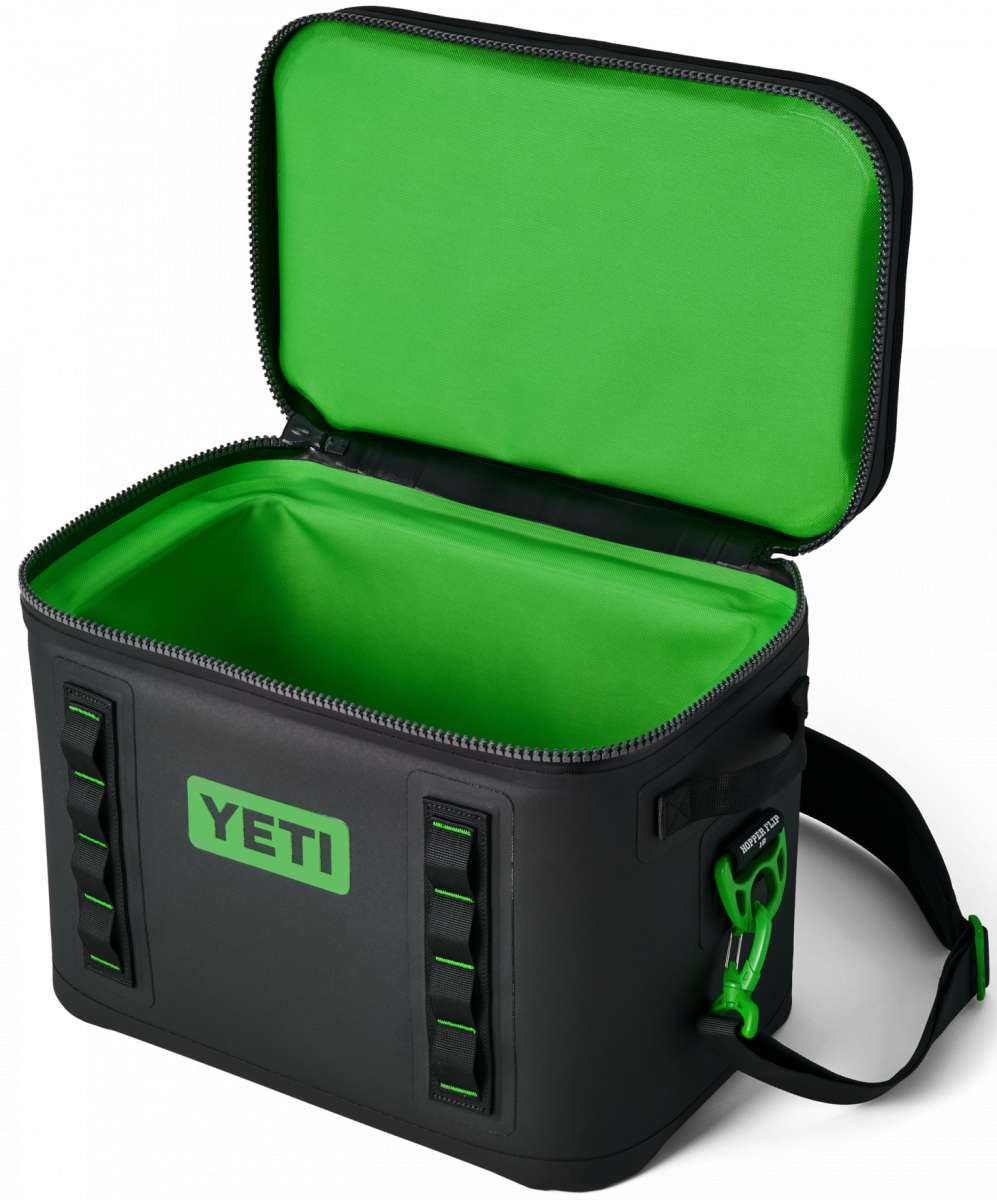 Yeti Hopper Flip 18 Personal Cooler - A black cooler with a green zipper and handle, featuring a rectangular shape and an open lid.