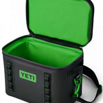 Yeti Hopper Flip 18 Personal Cooler - A black cooler with a green zipper and handle, featuring a rectangular shape and an open lid.