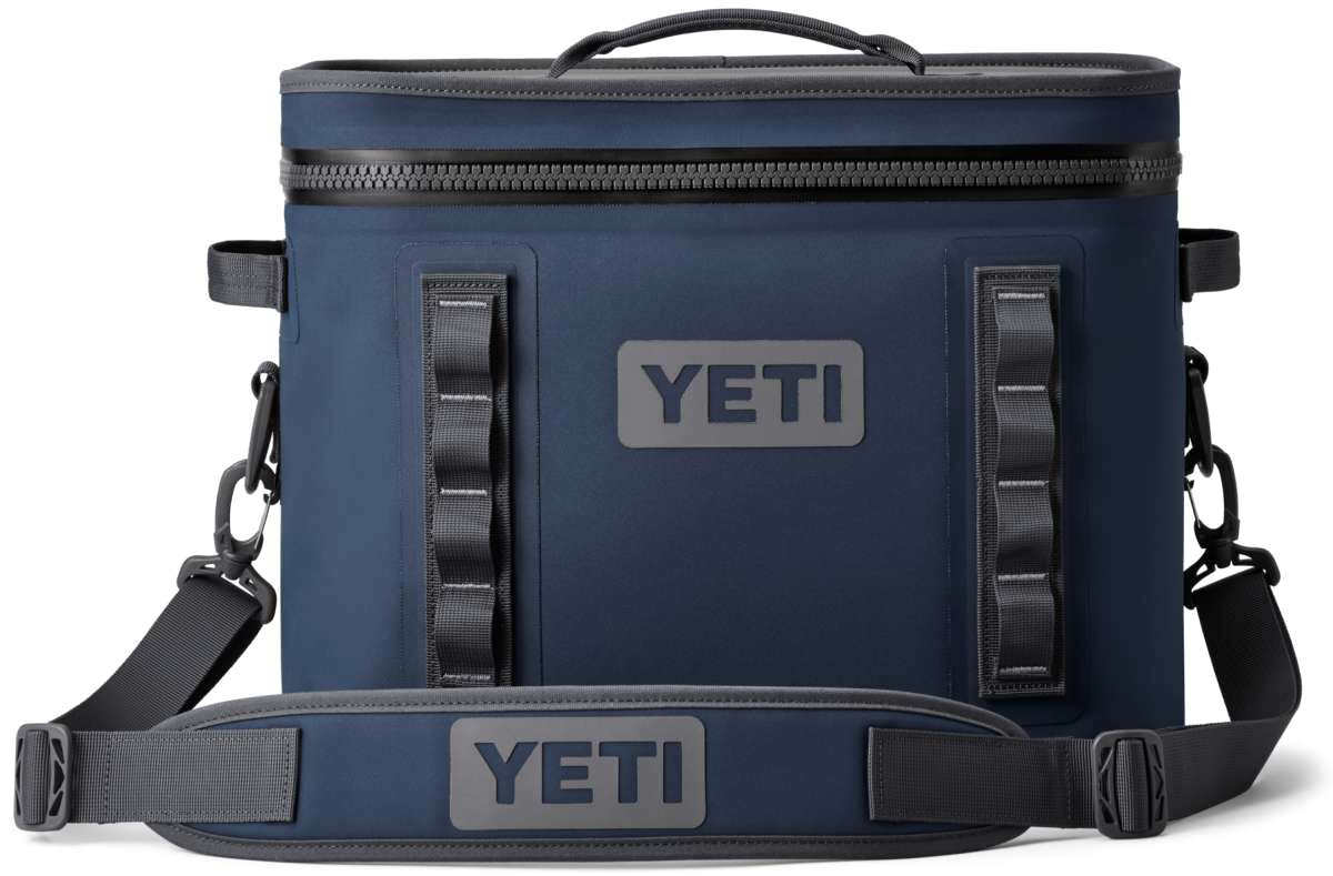 Yeti Hopper Flip 18 Personal Cooler - A navy blue cooler with a zippered top and two handles on either side.
