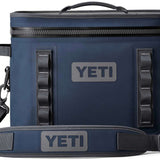 Yeti Hopper Flip 18 Personal Cooler - A navy blue cooler with a zippered top and two handles on either side.