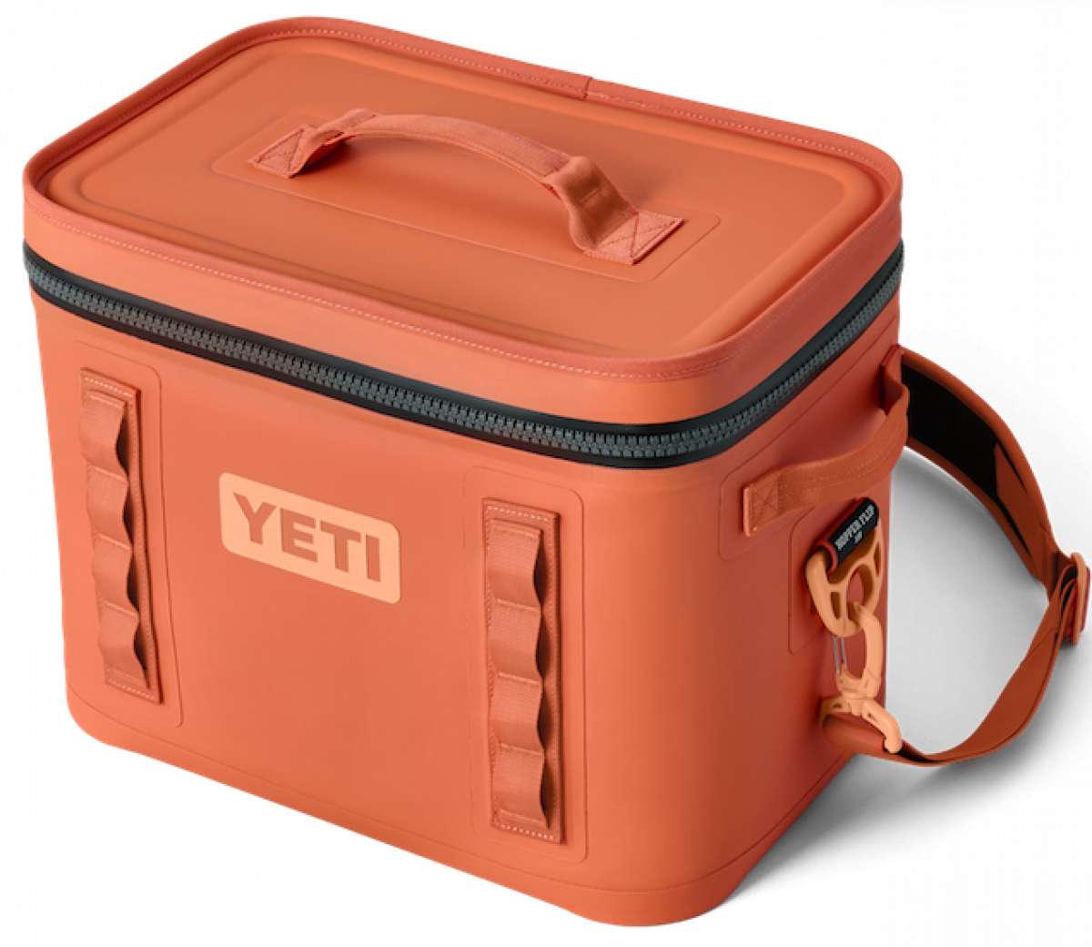 Yeti Hopper Flip 18 Personal Cooler - A coral-colored cooler with a zippered lid and two handles on top, featuring a rectangular shape and a flat bottom.