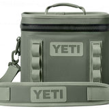 Yeti Hopper Flip 8 Personal Cooler - A dark gray cooler with a zipper closure and two handles, one on top and one on the side.