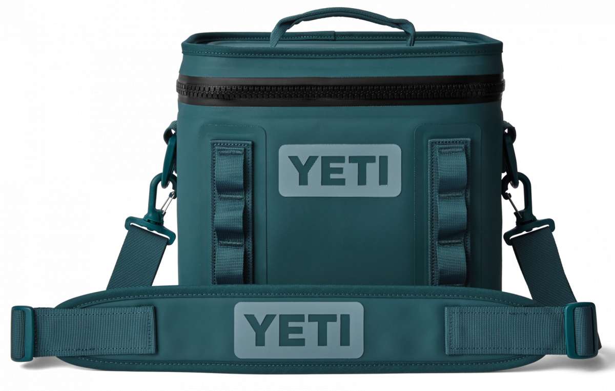 Yeti Hopper Flip 8 Personal Cooler - A dark gray cooler with a zippered top and two handles, one on each side.