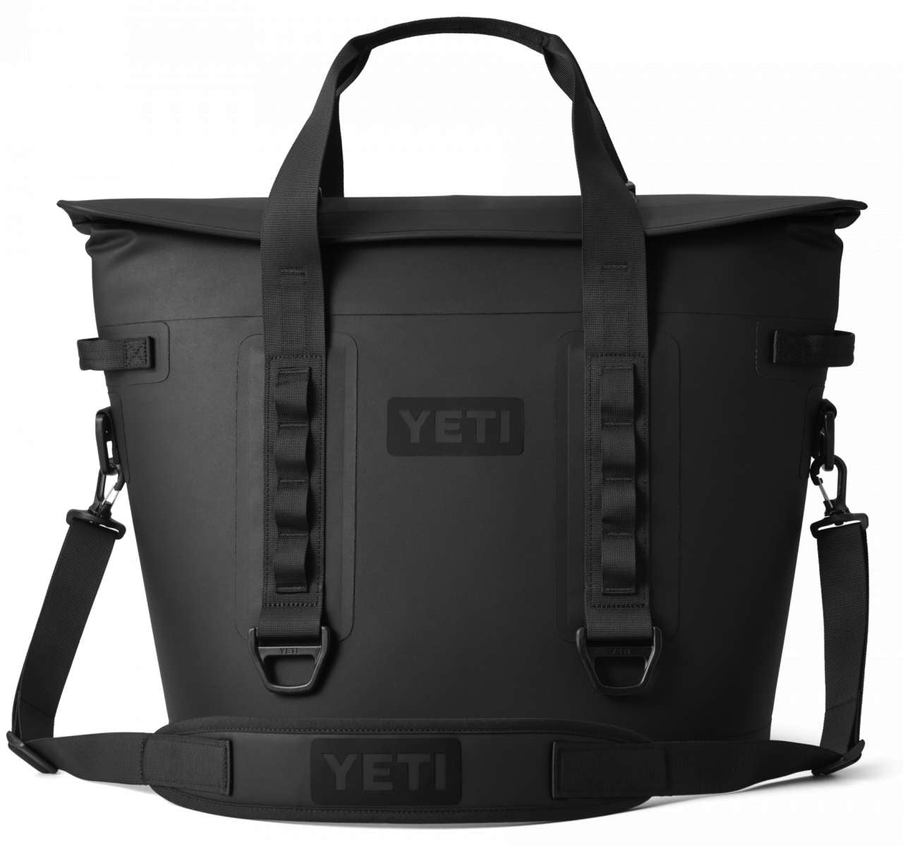 Yeti Hopper M30 2.0 Soft Cooler - A black cooler with a handle and shoulder strap, featuring a zippered top and two side pockets.