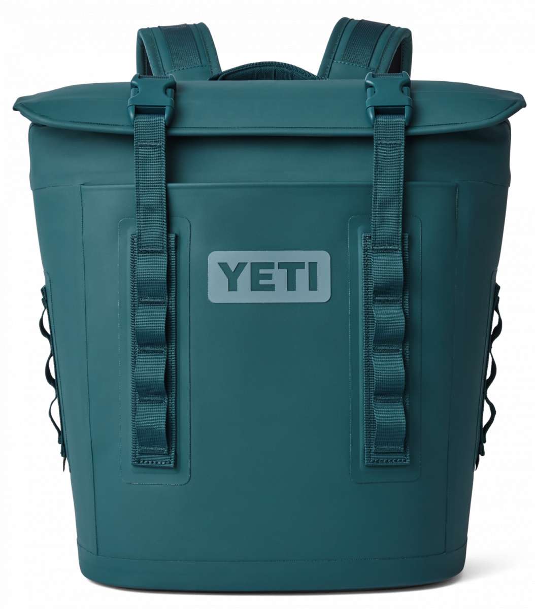 Yeti Hopper M12 Backpack Soft Cooler - A large, dark-colored backpack with a zippered main compartment and two smaller pockets on either side.