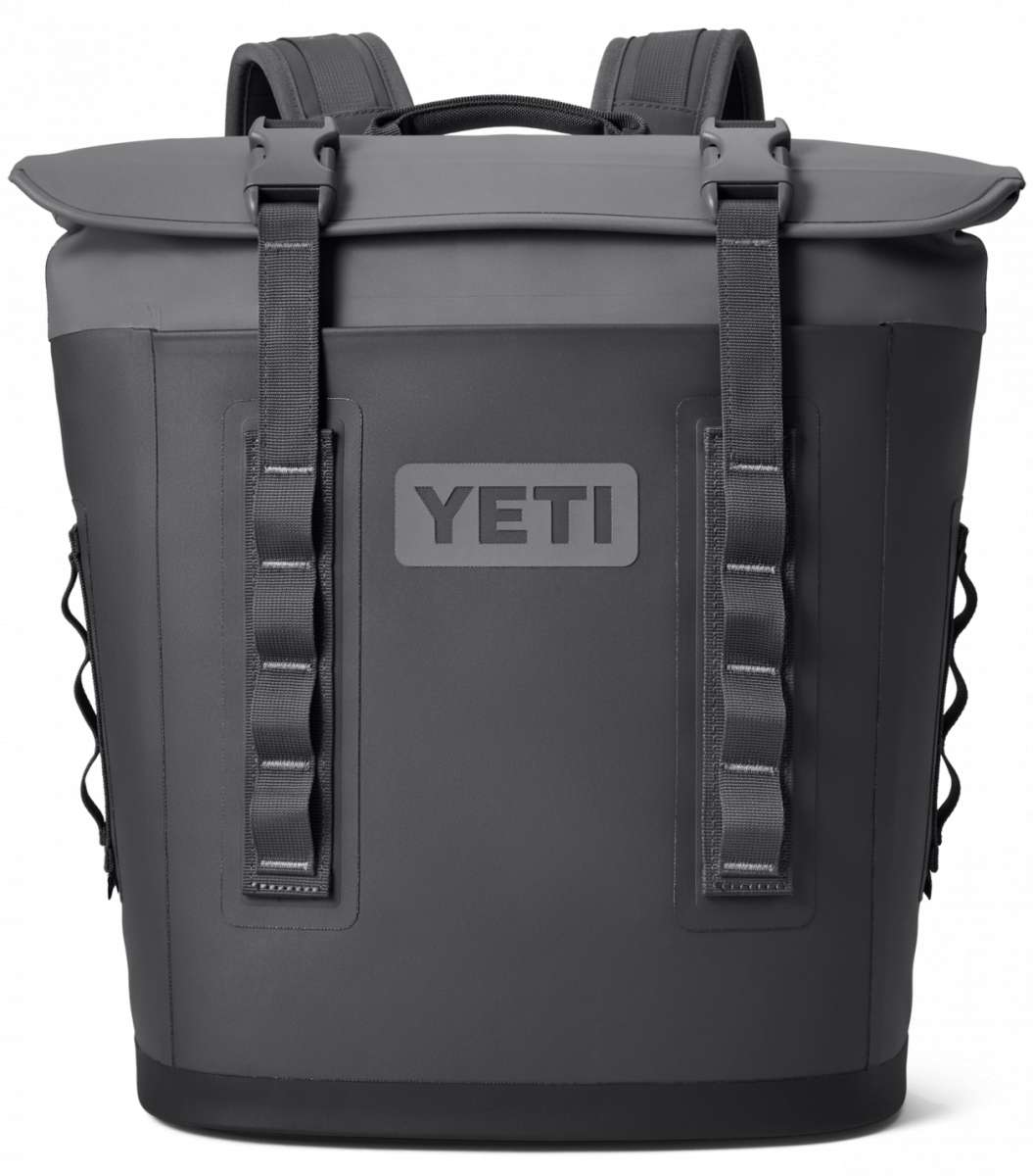 Yeti Hopper M12 Backpack Soft Cooler - A large, dark gray backpack-style cooler with a zippered main compartment and two side pockets.