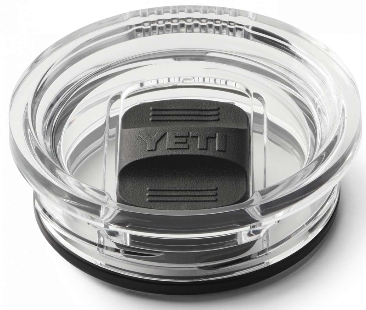 Yeti Rambler 20 oz. Travel Mug - A clear plastic travel mug with a black lid and embossed "YETI" logo on top.