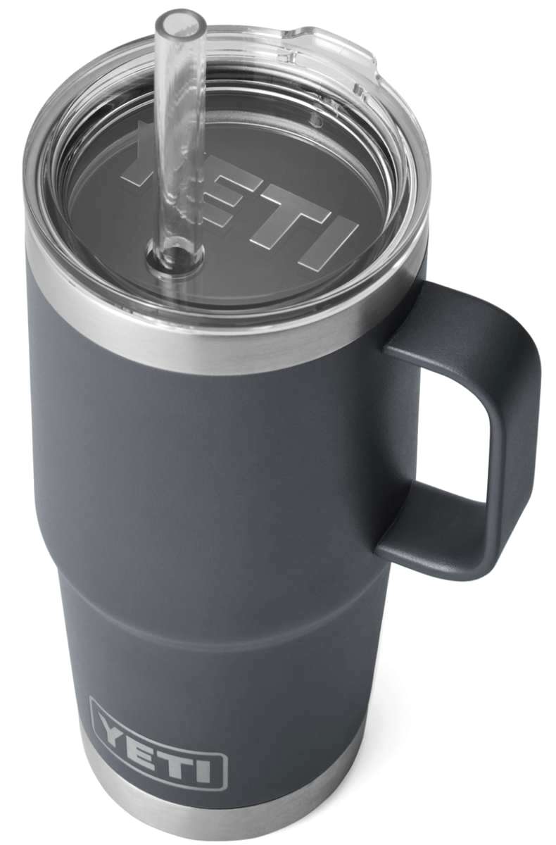 Yeti Rambler 25 oz. Straw Mug - A dark-colored tumbler with a clear plastic straw protruding from its lid.