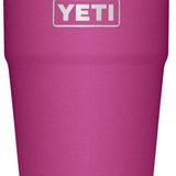 Yeti Rambler 26 oz. Straw Cup - A pink Yeti tumbler with a clear plastic straw and silver rim.