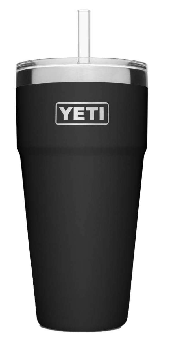 Yeti Rambler 26 oz. Straw Cup - A dark-colored tumbler with a clear plastic straw and lid, featuring the word "YETI" in white letters on one side.