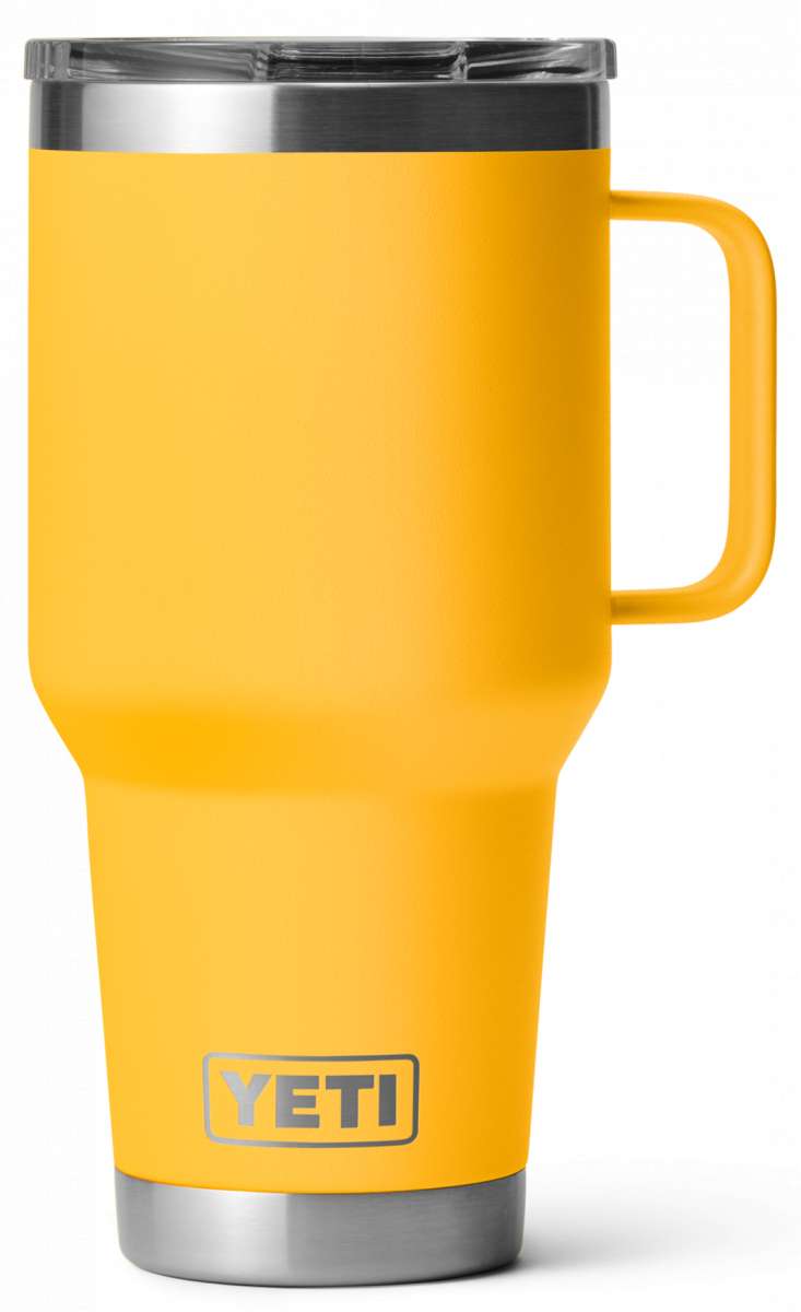 Yeti Rambler - 30 oz. Travel Mug is a stainless steel tumbler with a clear lid and handle, featuring a silver-colored body.