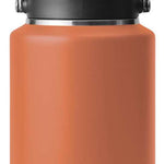 Yeti Rambler One Gallon Jug - A large, insulated jug with a screw-top lid and handle on top. It is primarily white with silver hardware.