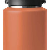 Yeti Rambler One Gallon Jug - A large, insulated jug with a screw-top lid and handle on top. It is primarily white with silver hardware.