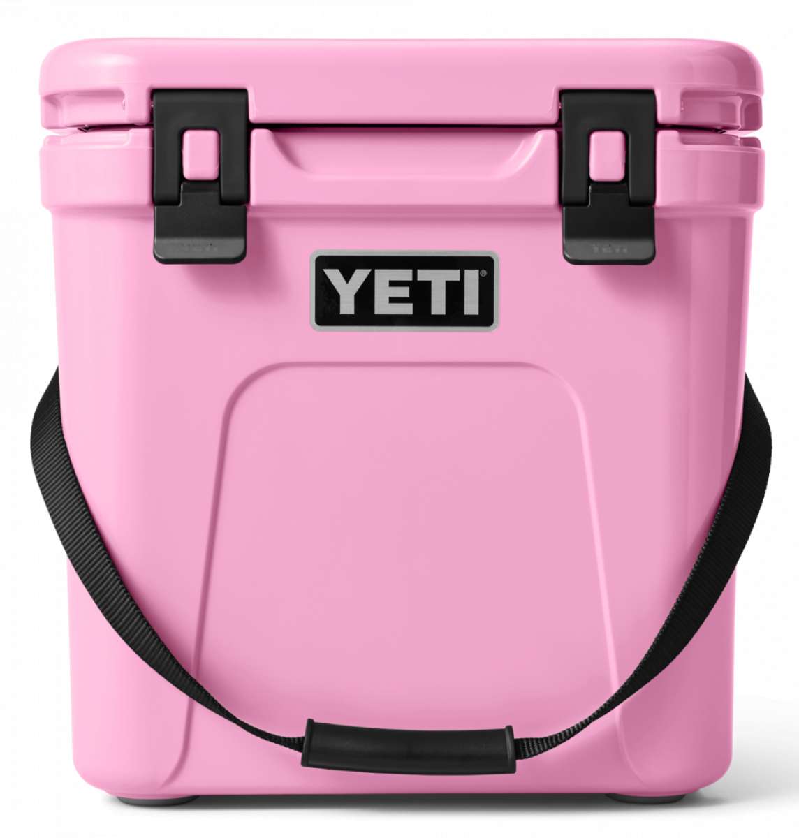 Yeti Roadie 24 Hard Cooler - A pink cooler with a black handle on top and a silver latch in front.