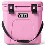 Yeti Roadie 24 Hard Cooler - A pink cooler with a black handle on top and a silver latch in front.