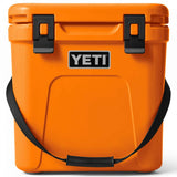 Yeti Roadie 24 Hard Cooler - A compact, portable cooler with a stainless steel handle and rubberized grip on top.