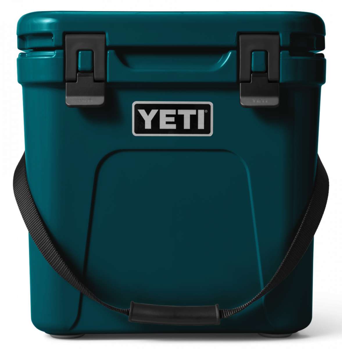 Yeti Roadie 24 Hard Cooler - A compact, portable cooler with a stainless steel handle and rubberized grip on top.