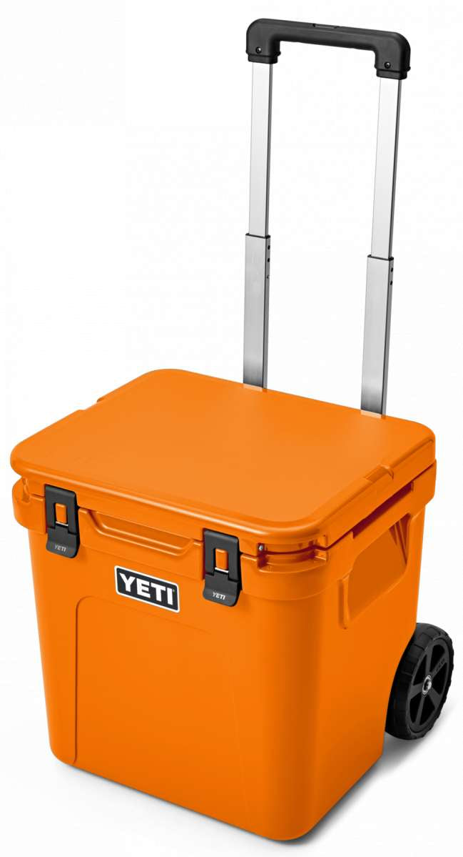 Yeti Roadie 48 Wheeled Cooler - A wheeled cooler with a handle on top and wheels at the bottom, featuring a large logo on the front that says "YETI" in white letters.