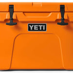 Yeti Tundra 35 Hard Cooler - A large, rectangular cooler with a dark gray lid and matching body, featuring a handle on top and a logo in silver lettering.