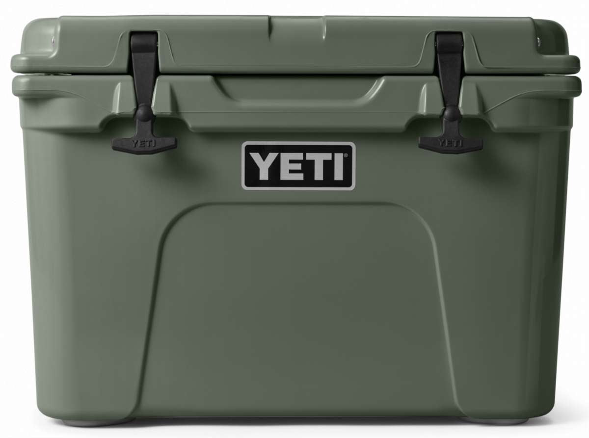 Yeti Tundra 35 Hard Cooler - A large, olive green cooler with a handle on top and two latches in front.