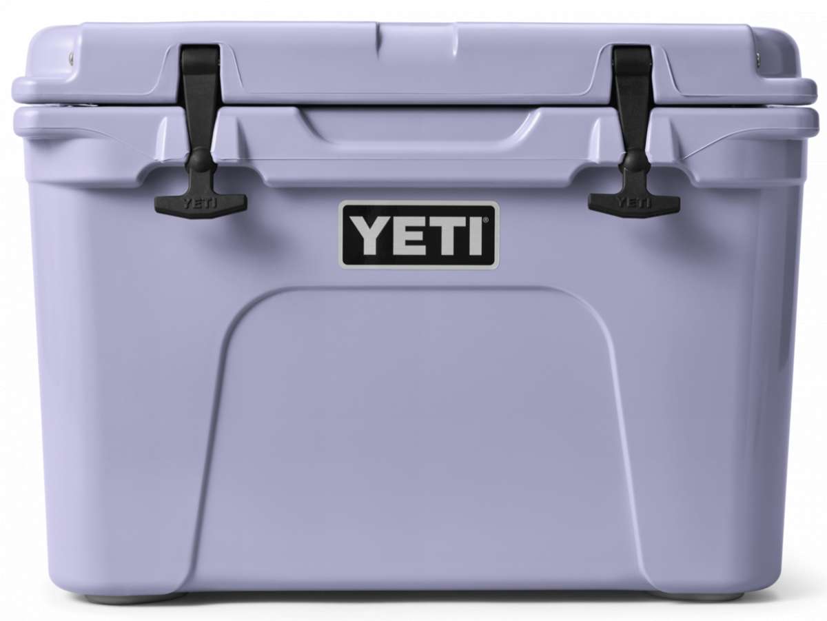 Yeti Tundra 35 Hard Cooler - A large, rectangular cooler with a light gray lid and matching gray body, featuring two black latches on either side of the lid.