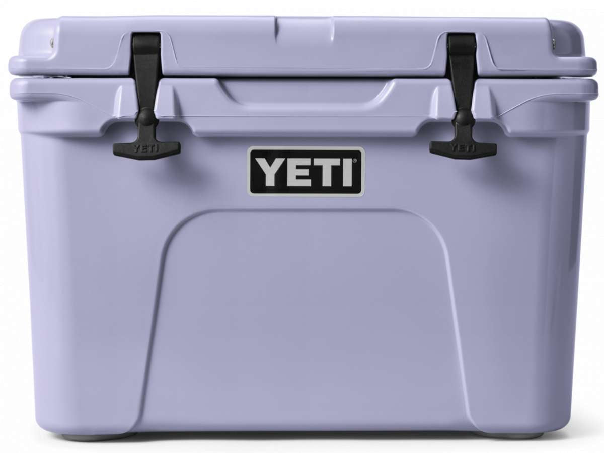 Yeti Tundra 35 Hard Cooler - A large, rectangular cooler with a light gray lid and matching gray body, featuring two black latches on either side of the lid.