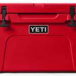 Yeti Tundra 45 Cooler - A red cooler with a black handle on top, featuring a white logo and a silver latch.