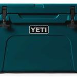 Yeti Tundra 45 Cooler - A large, rectangular cooler with a dark green lid and matching body, featuring two black latches on top.