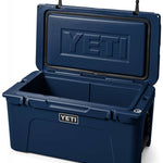 Yeti Tundra 65 Cooler - A large, rectangular cooler with a dark gray lid and matching body, featuring a prominent "YETI" logo on the front in white lettering.