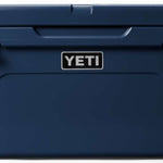 Yeti Tundra 65 Cooler - A large, rectangular cooler with a dark gray lid and matching body, featuring a handle on top and a logo in silver lettering.
