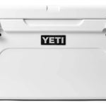 Yeti Tundra 65 Cooler - A large, white cooler with a black handle on top and a silver latch in the middle.