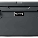 Yeti Tundra 65 Cooler - A large, rectangular cooler with a dark gray lid and matching body, featuring a handle on top and a logo in white lettering.