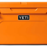 Yeti Tundra 65 Cooler - A large, rectangular cooler with a dark gray lid and matching body, featuring a handle on top and a logo in silver lettering.