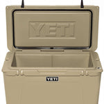 Yeti Tundra 75 Cooler - A large, tan cooler with a hinged lid and two black latches on top.